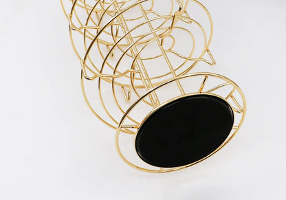 Porta cápsulas giratorio con estructura de metal dorado y base circular, para Dolce Gusto