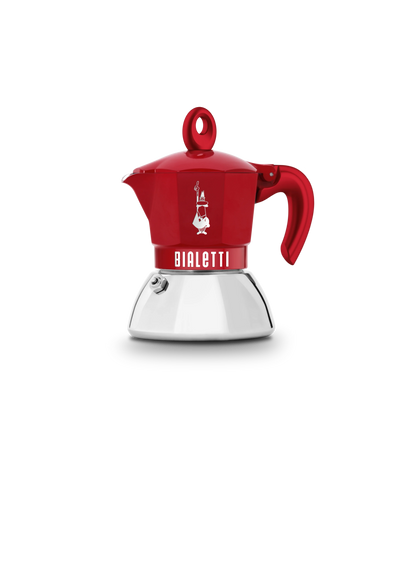 Cafetera moka de inducción roja Bialetti con base blanca y asa lateral.