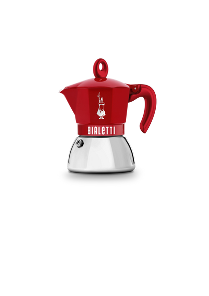Cafetera moka roja Bialetti con base blanca y asa ergonómica a un lado.