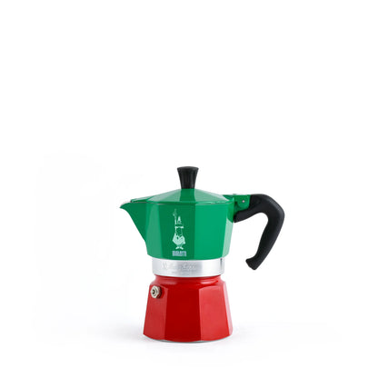 Cafetera moka tricolor con parte superior verde, cuerpo rojo y asa negra