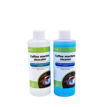 Dos botellas de solución: descalcificador verde y limpiador azul para cafetera automática