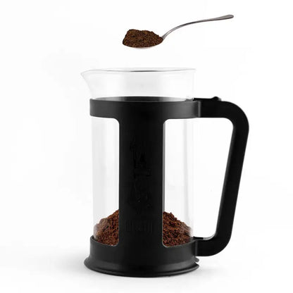 Prensa francesa Bialetti Smart negra con jarra de vidrio, émbolo y café en el interior