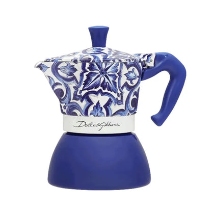 Cafetera moka de inducción azul con estampado azul y blanco y mango, estilo Bialetti.