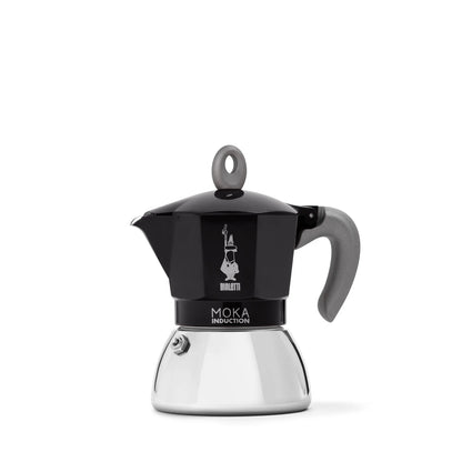 Cafetera italiana Moka de inducción Bialetti negra, vista frontal con asa curva