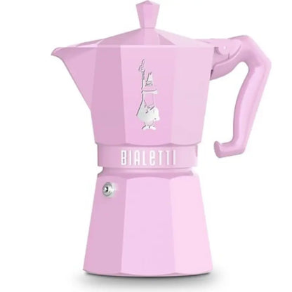 Cafetera moka Bialetti color rosa pastel, con asa y tapa superior