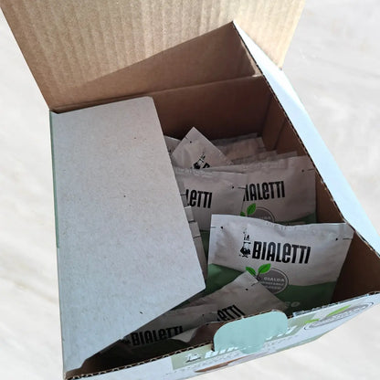 Caja abierta con sobres de cápsulas Bialetti ESE