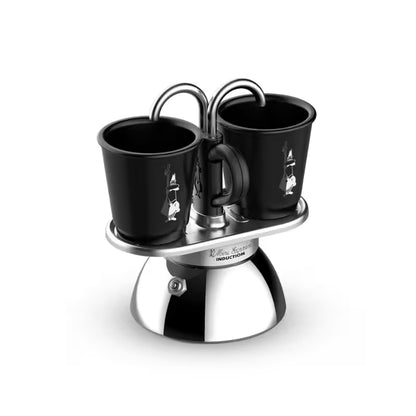 Cafetera Mini Induction con 2 tazas negras y base metálica
