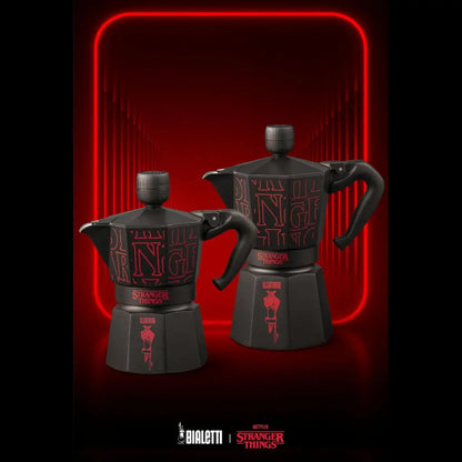 Cafeteras moka negras con estampado rojo y asas, conjunto de 2.