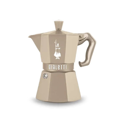 Cafetera italiana tipo moka octogonal color beige, con asa y tapa superior