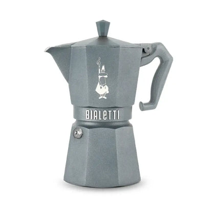 Cafetera tipo moka octogonal azul, vista frontal con asa y válvula superior