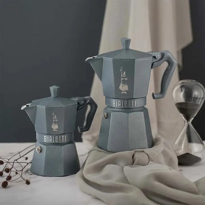 Juego de cafeteras tipo moka octogonales de color azul, con asas laterales