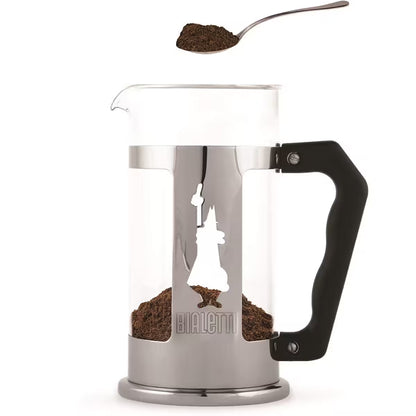 Prensa francesa Bialetti de acero inoxidable con asa negra y depósito transparente, vista frontal