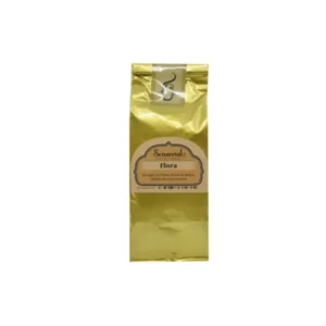 Vista vertical de la bolsita dorada de té Sensorial «Flora». El paquete contiene té negro, flores de malva, rosa y pétalos de peonía.