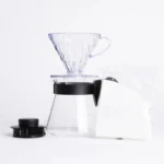 Kit Set de cafetera Hario con jarra de vidrio, dripper y filtros. Perfecto para disfrutar café filtrado de calidad y diseño.